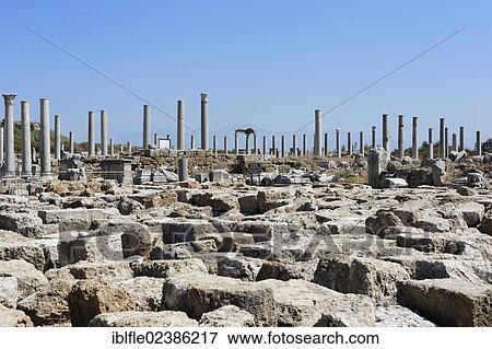 "Ruins and the avenue of columns in the Agora, marketplace in the excavation site in the ancient city of Perge, Aksu, Turkish Riviera, Antalya, Turkey, Asia" View Large Photo Image Stock Photo - "Ruins and the avenue of columns in the Agora, marketplace in the excavation site in the ancient city of Perge, Aksu, Turkish Riviera, Antalya, Turkey, Asia". Fotosearch