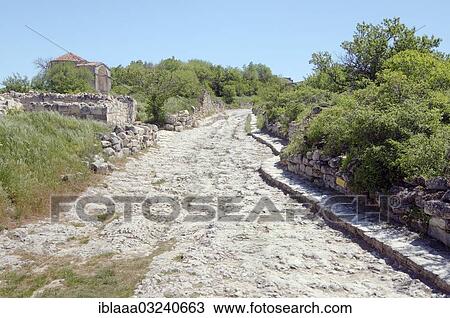 Stock Image - "Ruins of the medieval fortress, Chufut-Kale, near Bakhchysarai, Crimea, Ukraine, Europe". Fotosearch