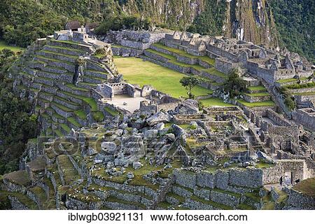 Stock Image - "Ruins, the Inca city of Machu Picchu with the main square or Plaza Principal and terraces, UNESCO World Heritage Site, Urubamba Valley, near Cusco, Andes, Peru, South America". Fotosearch