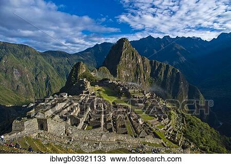 Stock Image - "Ruins, the Inca city of Machu Picchu with Huayna Picchu mountain, UNESCO World Heritage Site, Urubamba Valley, near Cusco, Andes, Peru, South America". Fotosearch