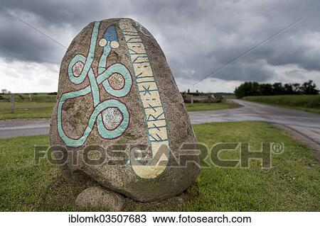 Stock Image - "Runestone, runes, Joermungandr, the World Serpent, Viking Museum, Ladby, Funen, Region of Southern Denmark, Denmark, Europe". Fotosearch