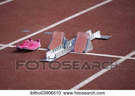 "Running shoes, running track, starting block" View Large Photo Image Stock Image - "Running shoes, running track, starting block". Fotosearch
