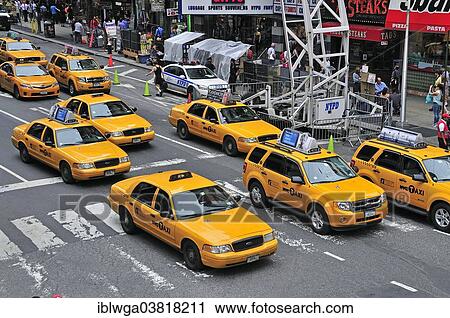 Stock Image - "Rush hour, taxis in Times Square, Midtown, Manhattan, New York City, USA". Fotosearch
