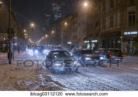 Stock Image - "Rush-hour traffic in Frankfurt during heavy snowfall, Westend, Frankfurt am Main, Hesse, Germany, Europe". Fotosearch