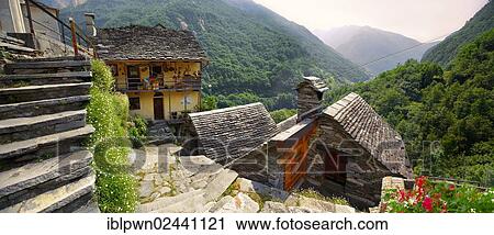 Stock Image - "Rustic mountain peasant village of Corippo with stone houses and church, Val Verzasca, Ticino, Alps, Switzerland, Europe". Fotosearch