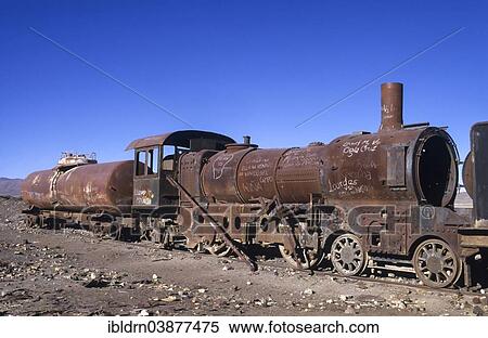 "Rusty locomotive, train cemetery in the middle of the altiplano desert, Salar de Uyuni or Salar de Tunupa, Uyuni, Altiplano, Bolivia, South America" View Large Photo Image Stock Photography - "Rusty locomotive, train cemetery in the middle of the altiplano desert, Salar de Uyuni or Salar de Tunupa, Uyuni, Altiplano, Bolivia, South America". Fotosearch