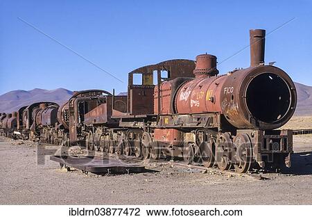 "Rusty locomotives, train cemetery in the middle of the altiplano desert, Salar de Uyuni or Salar de Tunupa, Uyuni, Altiplano, Bolivia, South America" View Large Photo Image Stock Image - "Rusty locomotives, train cemetery in the middle of the altiplano desert, Salar de Uyuni or Salar de Tunupa, Uyuni, Altiplano, Bolivia, South America". Fotosearch