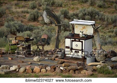 Stock Photo - "Rusty oven and sofa placed in the desert, near Escalante, Grand Staircase-Escalante National Monument, GSENM, Utah, Southwestern United States, USA". Fotosearch