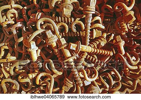 Rusty screws and metal holders View Large Photo Image Stock Photo - Rusty screws and metal holders. Fotosearch