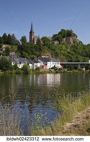 Stock Image - Saar banks with city view and Saarburg castle ruins, Saarburg, Saar river, Rhineland-Palatinate, Germany, Europe, PublicGround, Europe. Fotosearch