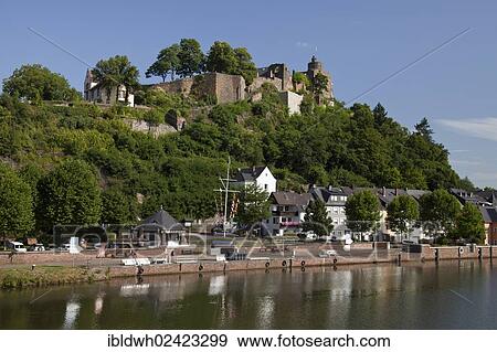 Saar shore with pier and above the Saarburg castle ruins, Saarburg, Saar river, Rhineland-Palatinate, Germany, Europe, PublicGround, Europe View Large Photo Image Stock Photo - Saar shore with pier and above the Saarburg castle ruins, Saarburg, Saar river, Rhineland-Palatinate, Germany, Europe, PublicGround, Europe. Fotosearch