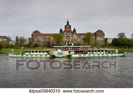 "Sachsische Staatskanzlei or Saxon State Chancellery, a pleasure boat passing on the Elbe river in the foreground, Dresden, Saxony, Germany, Europe" View Large Photo Image Stock Photography - "Sachsische Staatskanzlei or Saxon State Chancellery, a pleasure boat passing on the Elbe river in the foreground, Dresden, Saxony, Germany, Europe". Fotosearch