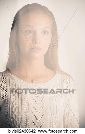 "Sad woman looking out of a window, partially hidden by reflection" View Large Photo Image Stock Image - "Sad woman looking out of a window, partially hidden by reflection". Fotosearch