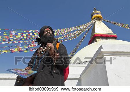 Stock Photo - "Sadhu, Holy Man of India, visiting Boudnath Stupa, Kathmandu Valley, Kathmandu, Kathmandu District, Bagmati Zone, Nepal, Asia". Fotosearch