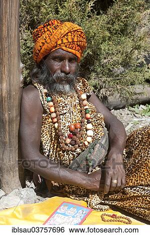 "Sadhu, holy man with turban and necklaces, Muktinath, Mustang, Nepal, Asia" View Large Photo Image Stock Photograph - "Sadhu, holy man with turban and necklaces, Muktinath, Mustang, Nepal, Asia". Fotosearch
