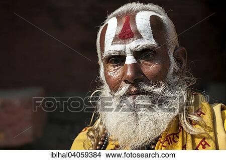 Picture - "Sadhu, painted face, beard, portrait, Kathmandu, Nepal, Asia". Fotosearch