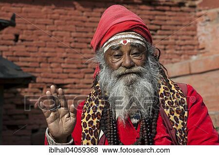"Sadhu, red turban and clothing, portrait, Kathmandu, Nepal, Asia" View Large Photo Image Stock Photo - "Sadhu, red turban and clothing, portrait, Kathmandu, Nepal, Asia". Fotosearch