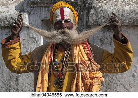 "Sadhu with a long beard, painted face, portrait, Pashupatinath, Kathmandu, Nepal, Asia" View Large Photo Image Stock Photography - "Sadhu with a long beard, painted face, portrait, Pashupatinath, Kathmandu, Nepal, Asia". Fotosearch