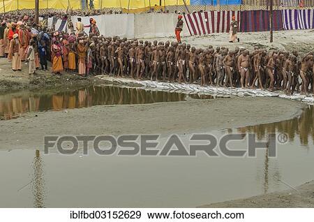 "Sadhus walking to the river Ganges after shaving their heads as part of their initiation, during Kumbha Mela festival, Allahabad, Uttar Pradesh, India, Asia" View Large Photo Image Stock Photo - "Sadhus walking to the river Ganges after shaving their heads as part of their initiation, during Kumbha Mela festival, Allahabad, Uttar Pradesh, India, Asia". Fotosearch