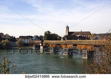 Saeckinger Bridge, longest covered wooden bridge in Europe, crossing over the Rhine River between Bad Saeckingen in Germany and Stein in Switzerland, Europe, PublicGround View Large Photo Image Stock Photograph - Saeckinger Bridge, longest covered wooden bridge in Europe, crossing over the Rhine River between Bad Saeckingen in Germany and Stein in Switzerland, Europe, PublicGround. Fotosearch
