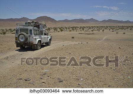 "Safari vehicle in the Hoarusib river valley, Purros, Kaokoland, Kunene, Namibia, Africa" View Large Photo Image Picture - "Safari vehicle in the Hoarusib river valley, Purros, Kaokoland, Kunene, Namibia, Africa". Fotosearch