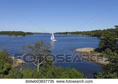"Sailboat and typical round polished rocks, roches moutonnees, on Finnhamn Island in the Stockholm Middle Archipelago, Stockholm, Sweden, Europe" View Large Photo Image Stock Photography - "Sailboat and typical round polished rocks, roches moutonnees, on Finnhamn Island in the Stockholm Middle Archipelago, Stockholm, Sweden, Europe". Fotosearch