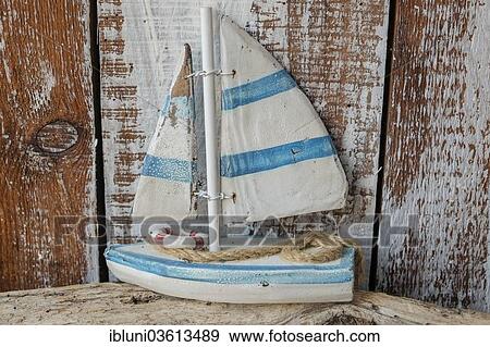 "Sailboat model made of wood, Maasholm, Schleswig-Holstein, Germany, Europe" View Large Photo Image Stock Photo - "Sailboat model made of wood, Maasholm, Schleswig-Holstein, Germany, Europe". Fotosearch