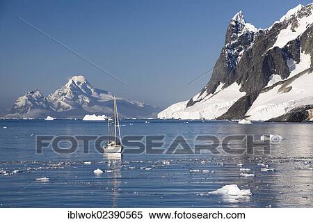 Stock Photography - "Sailboat off the Antarctic Peninsula, Graham Land, Antarctica". Fotosearch