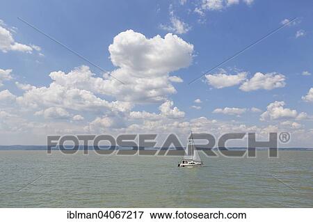 "Sailboat on Lake Neusiedl, Northern Burgenland, Burgenland, Austria, Europe" View Large Photo Image Stock Photo - "Sailboat on Lake Neusiedl, Northern Burgenland, Burgenland, Austria, Europe". Fotosearch