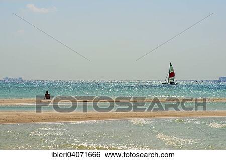 "Sailboat on sparkling sea, Paradise Island, Maldives, Asia" View Large Photo Image Stock Photograph - "Sailboat on sparkling sea, Paradise Island, Maldives, Asia". Fotosearch