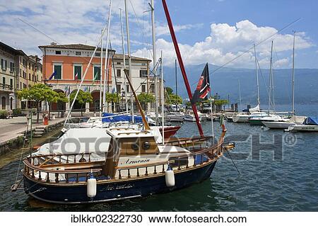 Stock Image - "Sailboats, Gardone Riviera on Lake Garda, Italy, Europe". Fotosearch