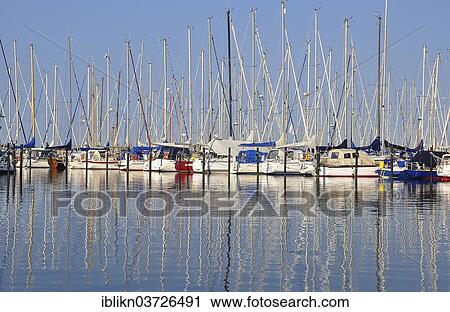 "Sailboats in a marina, Heiligenhafen, Schleswig-Holstein, Germany, Europe" View Large Photo Image Stock Image - "Sailboats in a marina, Heiligenhafen, Schleswig-Holstein, Germany, Europe". Fotosearch