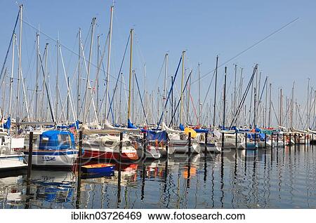 "Sailboats in a marina, Heiligenhafen, Schleswig-Holstein, Germany, Europe" View Large Photo Image Stock Photo - "Sailboats in a marina, Heiligenhafen, Schleswig-Holstein, Germany, Europe". Fotosearch