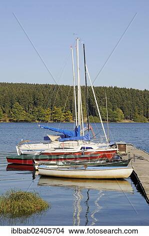 "Sailboats on a dock, Bruchertalsperre Reservoir, Marienheide, Bergisches Land, North Rhine-Westphalia, Germany, Europe, PublicGround, Europe" View Large Photo Image Picture - "Sailboats on a dock, Bruchertalsperre Reservoir, Marienheide, Bergisches Land, North Rhine-Westphalia, Germany, Europe, PublicGround, Europe". Fotosearch