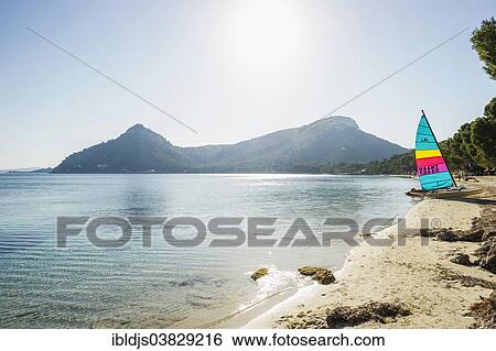 "Sailing boat and beach, Platja Formentor, Cap de Formentor, Pollenca, Majorca, Balearic Islands, Spain, Europe" View Large Photo Image Stock Photograph - "Sailing boat and beach, Platja Formentor, Cap de Formentor, Pollenca, Majorca, Balearic Islands, Spain, Europe". Fotosearch