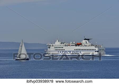 "Sailing boat and ferry of the Jadrolinija shipping company, near Split, Dalmatia, Croatia, Europe" View Large Photo Image Stock Photo - "Sailing boat and ferry of the Jadrolinija shipping company, near Split, Dalmatia, Croatia, Europe". Fotosearch