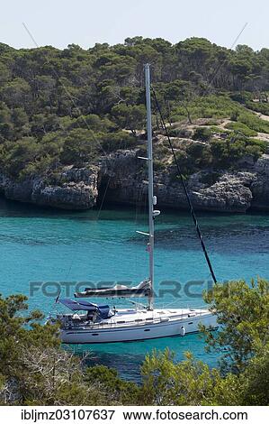 "Sailing boat at the harbour entrance of Figuera, Cala Figuera, Mallorca, Majorca, Balearic Islands, Spain, Europe" View Large Photo Image Stock Photo - "Sailing boat at the harbour entrance of Figuera, Cala Figuera, Mallorca, Majorca, Balearic Islands, Spain, Europe". Fotosearch