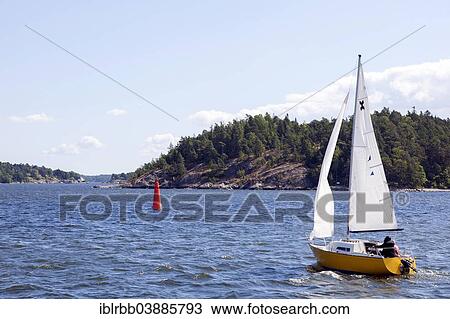 Stock Image - "Sailing boat in the Stockholm archipelago, Stockholm, Stockholm County, Sweden, Europe". Fotosearch