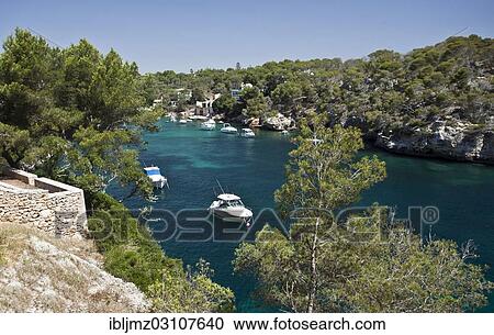 "Sailing boats at the harbour entrance of Figuera, Cala Figuera, Mallorca, Majorca, Balearic Islands, Spain, Europe" View Large Photo Image Stock Image - "Sailing boats at the harbour entrance of Figuera, Cala Figuera, Mallorca, Majorca, Balearic Islands, Spain, Europe". Fotosearch