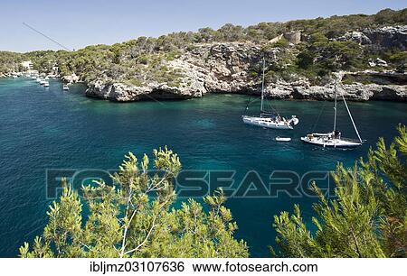 "Sailing boats at the harbour entrance of Figuera, Cala Figuera, Mallorca, Majorca, Balearic Islands, Spain, Europe" View Large Photo Image Stock Photograph - "Sailing boats at the harbour entrance of Figuera, Cala Figuera, Mallorca, Majorca, Balearic Islands, Spain, Europe". Fotosearch