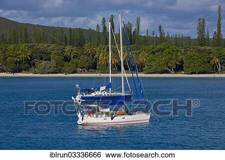 "Sailing boats in the Bay de Kuto, Ile des Pins, New Caledonia, France, Oceania" View Large Photo Image Stock Photograph - "Sailing boats in the Bay de Kuto, Ile des Pins, New Caledonia, France, Oceania". Fotosearch