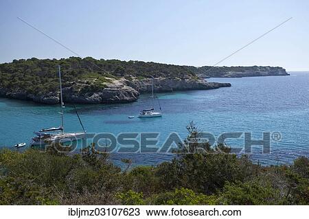 "Sailing boats in the Calo d'en Garrot bay, Parc Natural de Mondrago, Mallorca, Majorca, Balearic Islands, Spain, Europe" View Large Photo Image Stock Image - "Sailing boats in the Calo d'en Garrot bay, Parc Natural de Mondrago, Mallorca, Majorca, Balearic Islands, Spain, Europe". Fotosearch