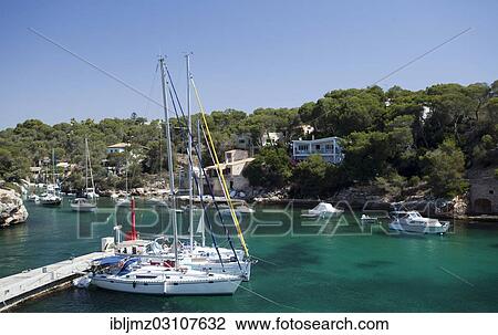 "Sailing boats in the harbour of Figuera, Cala Figuera, Mallorca, Majorca, Balearic Islands, Spain, Europe" View Large Photo Image Stock Image - "Sailing boats in the harbour of Figuera, Cala Figuera, Mallorca, Majorca, Balearic Islands, Spain, Europe". Fotosearch