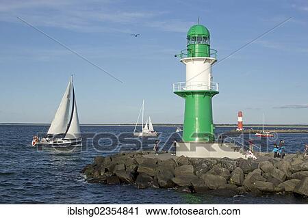 Stock Image - "Sailing boats in the Warnow river estuary, Warnemuende, Mecklenburg-Western Pomerania, Germany, Europe". Fotosearch