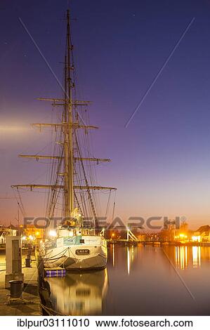"Sailing ship in the fishing port at dusk, Wieck, Greifswald, Mecklenburg-Western Pomerania, Germany, Europe" View Large Photo Image Stock Image - "Sailing ship in the fishing port at dusk, Wieck, Greifswald, Mecklenburg-Western Pomerania, Germany, Europe". Fotosearch
