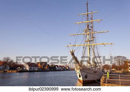 Stock Photo - "Sailing ship, in the harbour of Wieck in the evening, Greifswald, Mecklenburg-Western Pomerania, Germany, Europe". Fotosearch