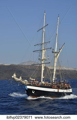"Sailing ship """"Thalassa"""" in the Caldera, Santorini, Cyclades, Greek Islands, Greece, Europe" View Large Photo Image Stock Image - "Sailing ship """"Thalassa"""" in the Caldera, Santorini, Cyclades, Greek Islands, Greece, Europe". Fotosearch