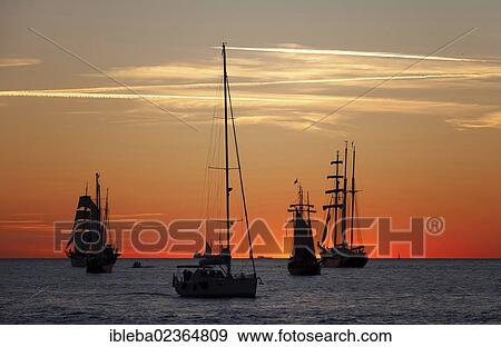 "Sailing ships at sunset, Hanse Sail 2012 festival, Rostock, Mecklenburg-Western Pomerania, Germany, Europe" View Large Photo Image Stock Photo - "Sailing ships at sunset, Hanse Sail 2012 festival, Rostock, Mecklenburg-Western Pomerania, Germany, Europe". Fotosearch