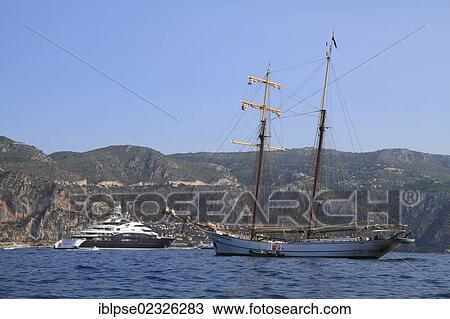"Sailing yacht """"Sir Robert Baden Powell"""", built by shipyard Edgar Andre, length 42m, built in 1957, and Motor yacht """"Serene"""", built by Fincantieri, length 133. 9m, built in 2011, at Cap Ferrat, Cote d'Azur, France, Mediterranean, Europe" View Large Photo Image Stock Image - "Sailing yacht """"Sir Robert Baden Powell"""", built by shipyard Edgar Andre, length 42m, built in 1957, and Motor yacht """"Serene"""", built by Fincantieri, length 133. 9m, built in 2011, at Cap Ferrat, Cote d'Azur, France, Mediterranean, Europe". Fotosearch