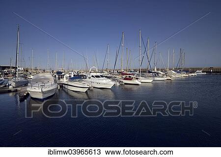 "Sailing yachts in the marina of Puerto Calero, Lanzarote, Canary Islands, Spain, Europe" View Large Photo Image Stock Image - "Sailing yachts in the marina of Puerto Calero, Lanzarote, Canary Islands, Spain, Europe". Fotosearch